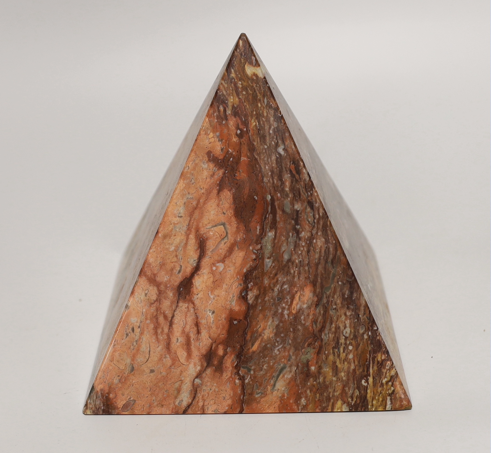 A marble pyramid desk weight, 16cm high